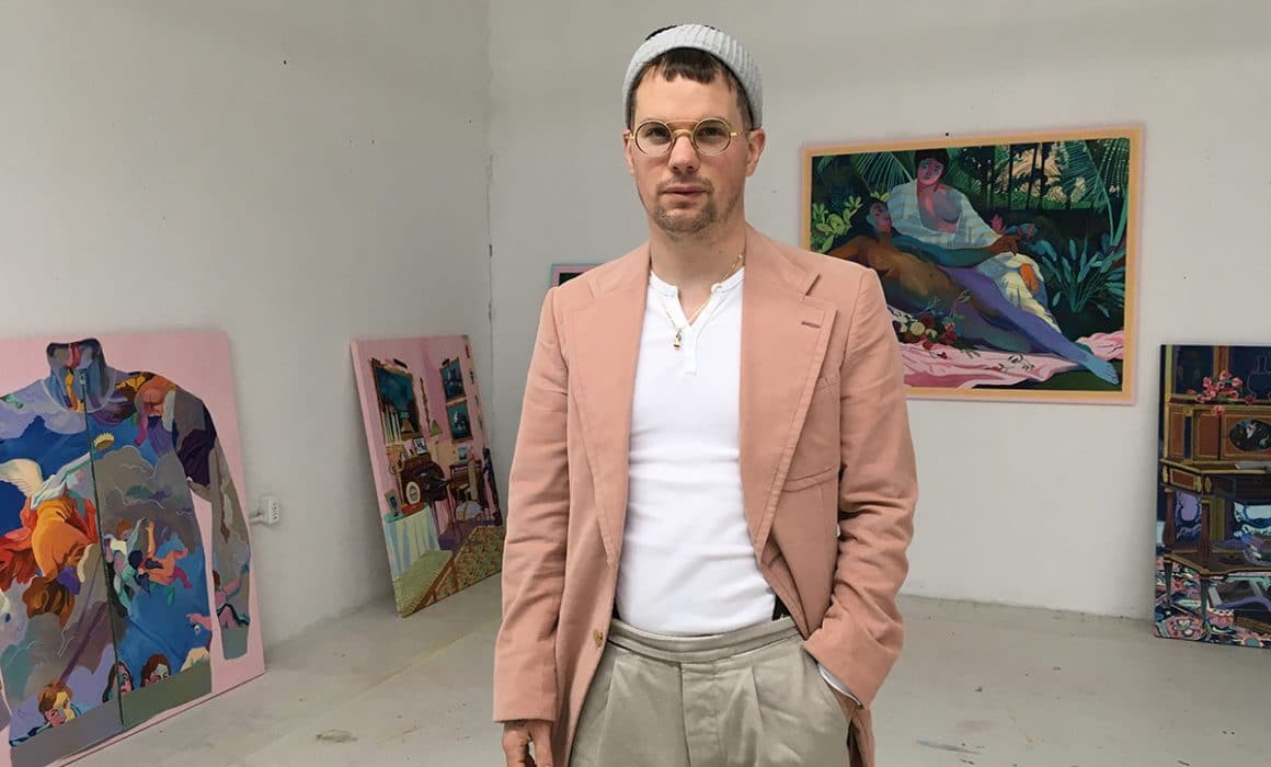 Portrait of Canadian painter Andy Dixon in his downtown LA studio in front of paintings.